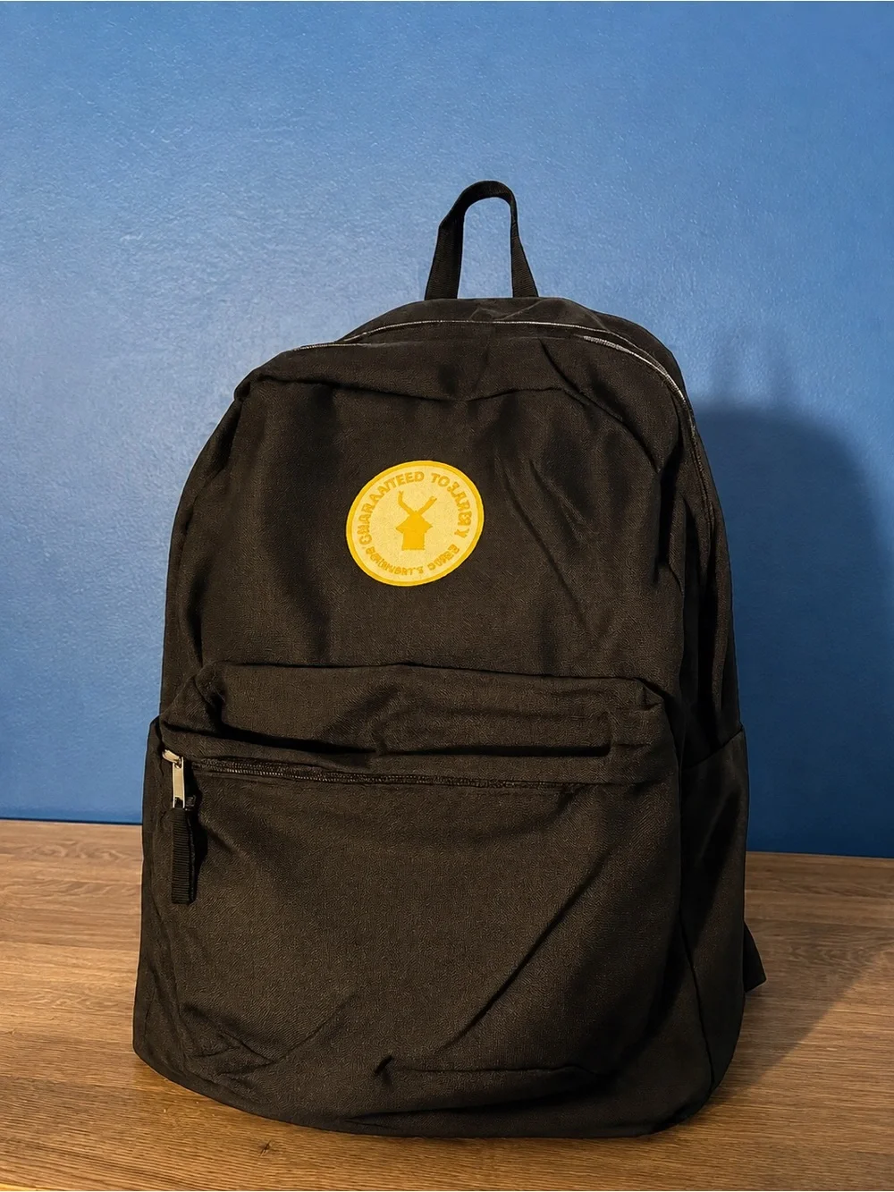 Dutch Bros Backpack with Yellow Logo Patch